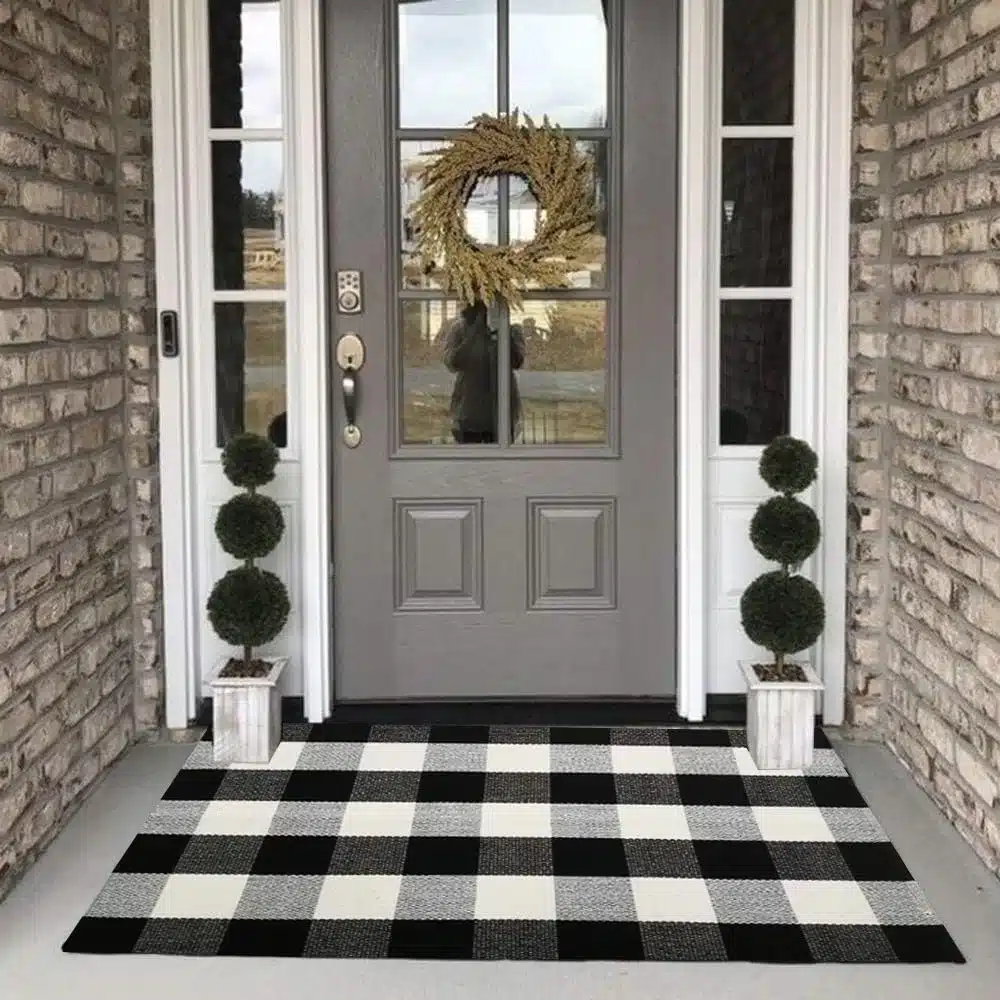 Keep fall decor of 2024 simple with a front porch mat.