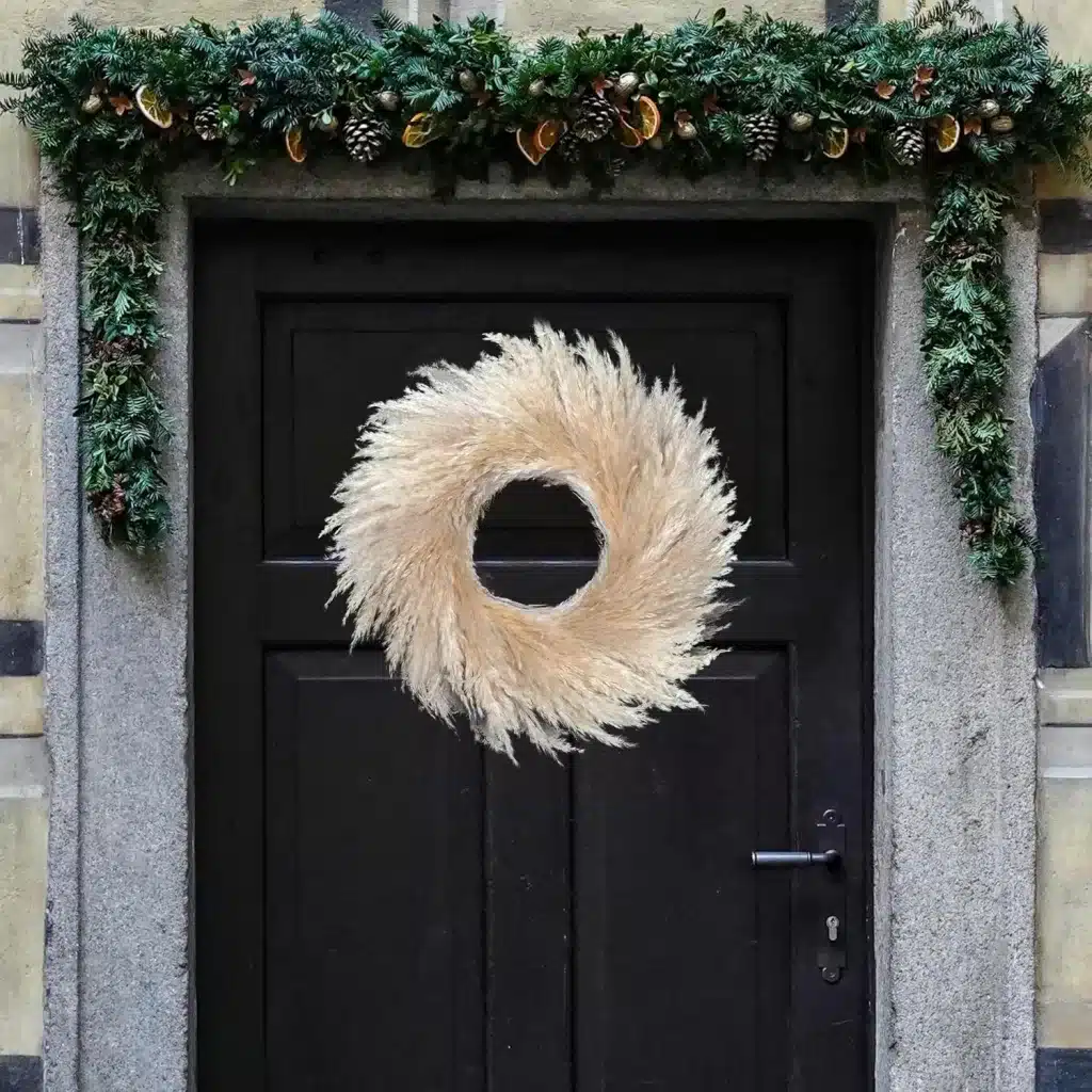 The contrast is great with the pompas and black door.