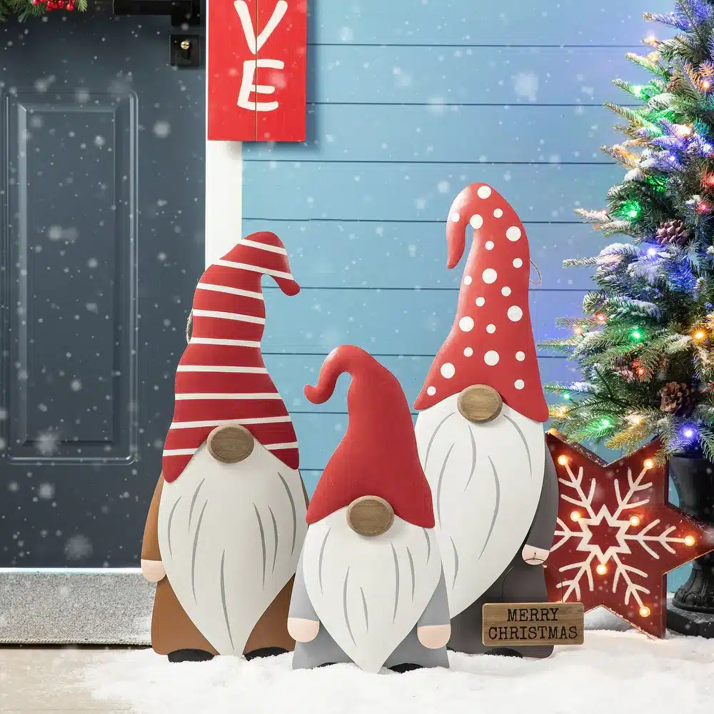 3 cute gnomes in outdoor decor