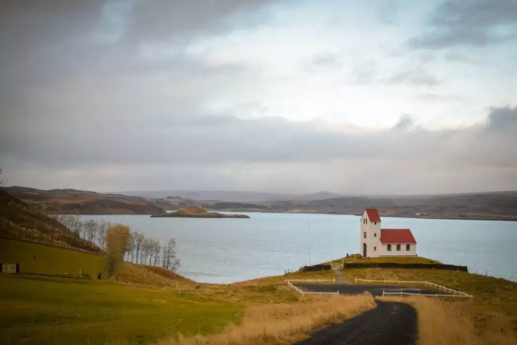 If you self-drive the Golden Circle route in Iceland, you can find this church on the west side of the lake in Thingvellir