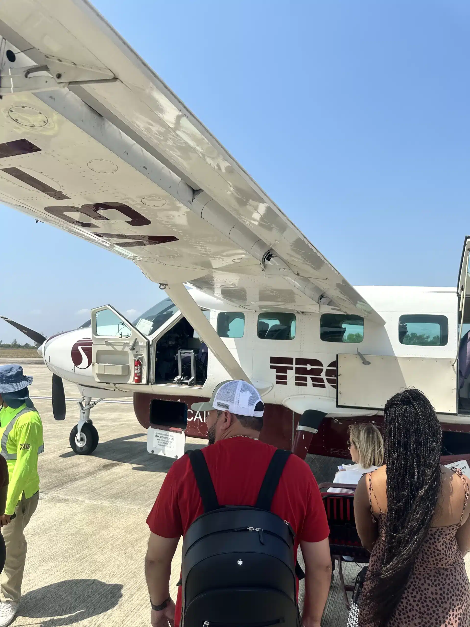 I usually use Expedia to book my vacations and flights. Here we are boarding Tropic air flight to San Pedro which is a the best Caribbean vacation idea for families.