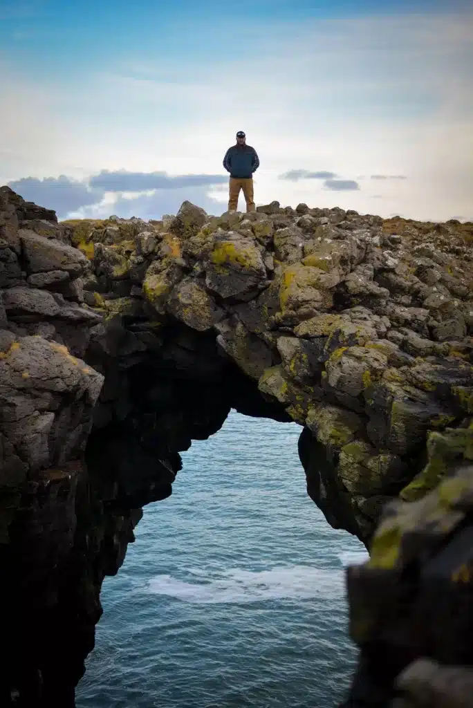 Walking over natural bridges in Iceland. 