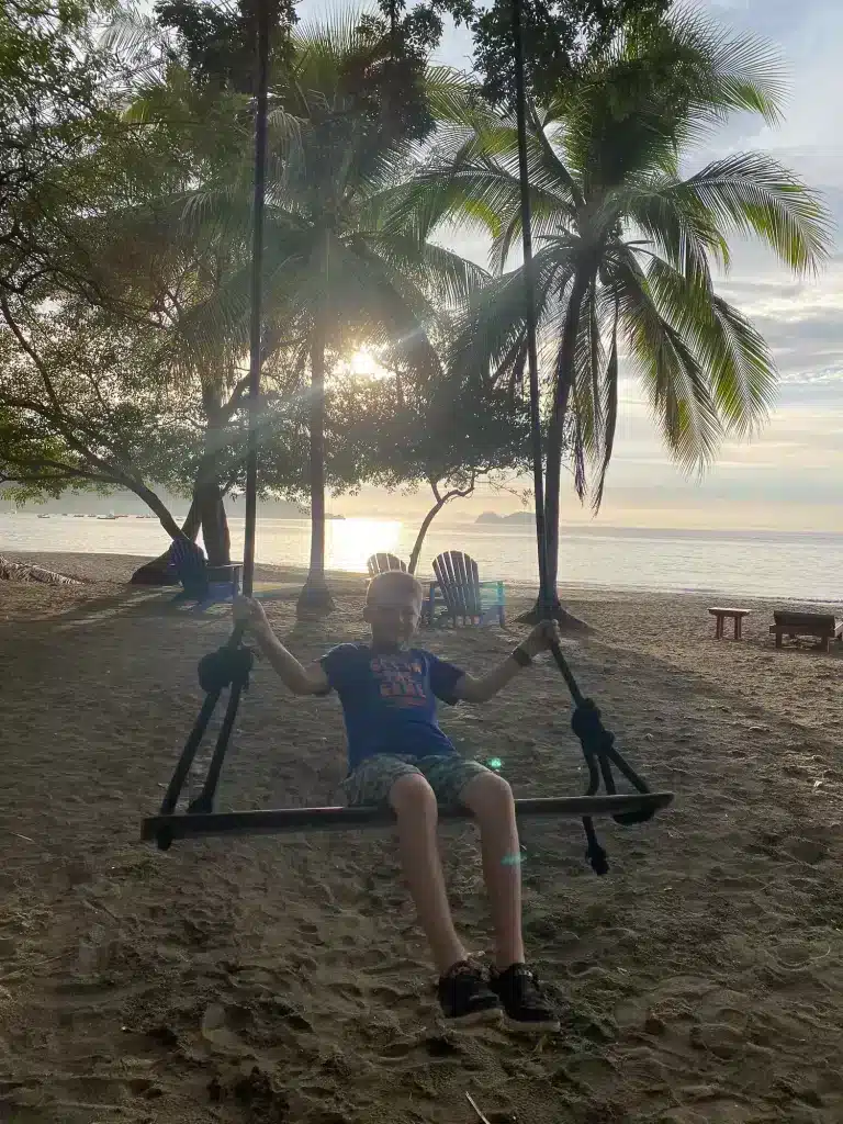 Swinging at one of Guanacaste, Costa Rica's beach restaurants which is a great way to end your day of travel and tours.