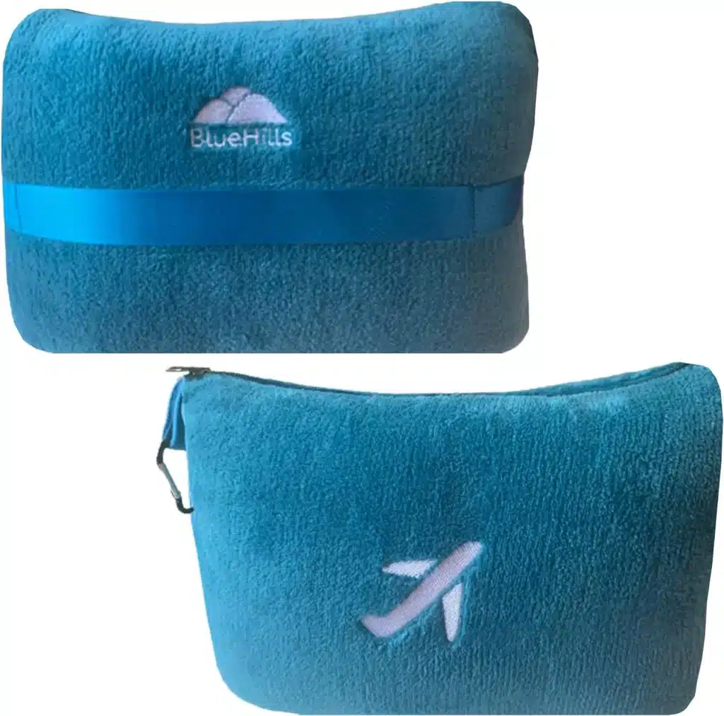 This travel blanket doubles as a pillow too for ultimate travel comfort. 