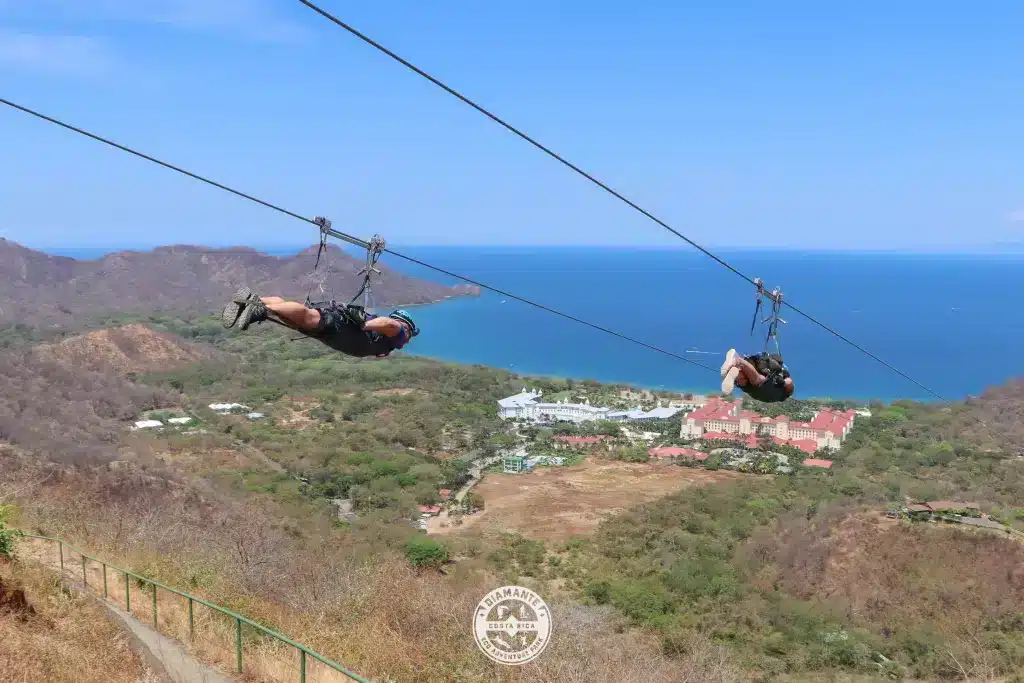 Zip lining superman style in Guanacaste at Diamante, overlooking Rui Palace. 